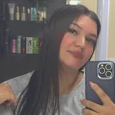 Pabla Melo Klauss, de 29 anos, era responsável por 'gerenciar as finanças' de um grupo criminoso no município — Foto: Reprodução