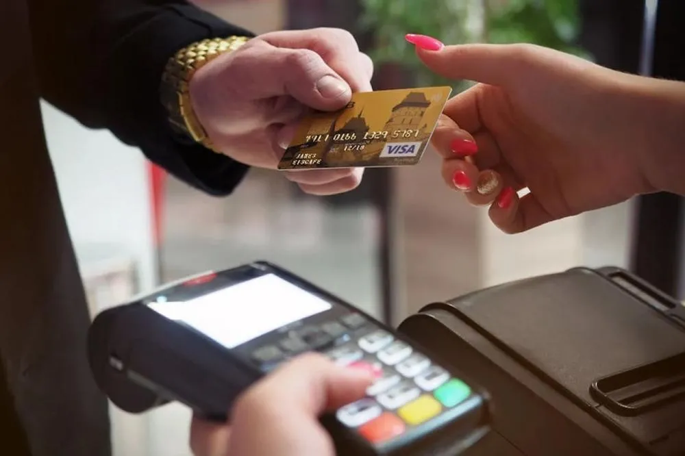 https://www.pexels.com/pt-br/foto/terminal-de-pagamento-preto-2988232/