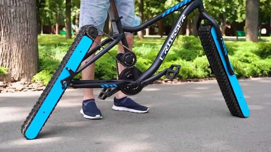 Veja como The Q reinventou a bicicleta usando esteiras como as de tanques de guerra. (Foto: Reprodução, YouTube)