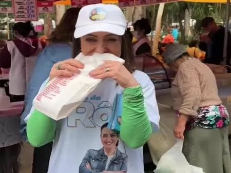 Rosangela Moro aparece em vídeo comendo pastel enquanto mulher vasculha lixo Imagem: Reprodução/Twitter
